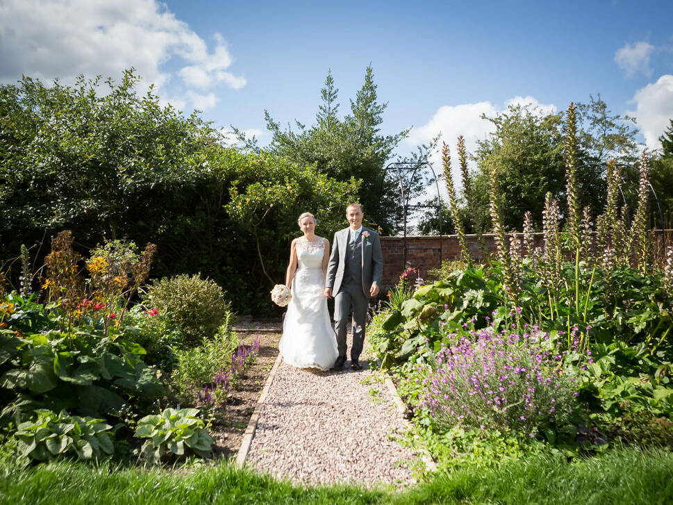 Wedding Couple in Gardens at Rowton Hall Hotel