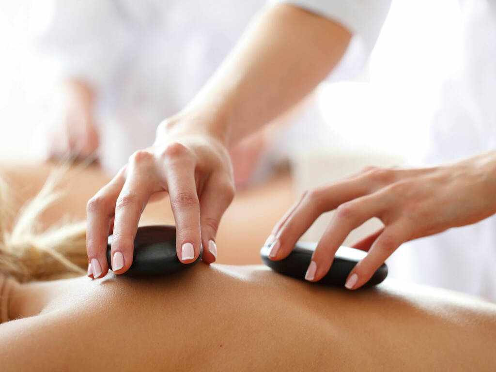 Hot stone back treatment