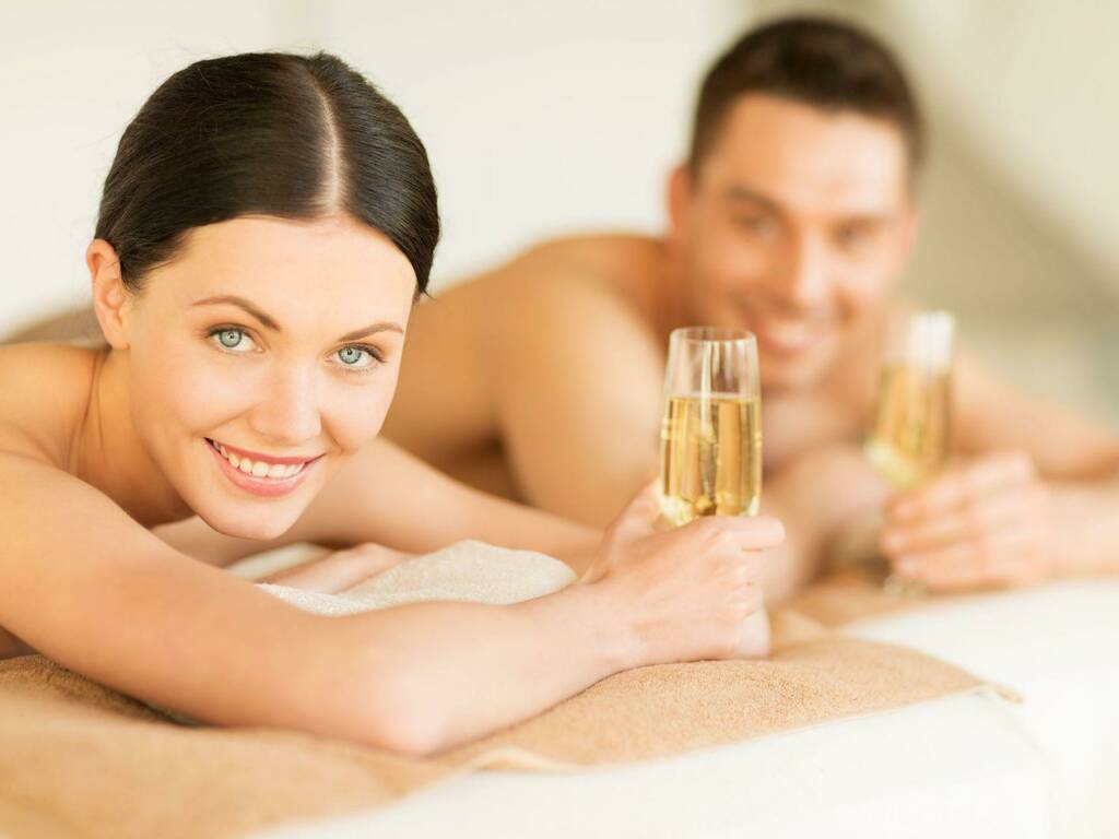 Couple enjoying spa treatments