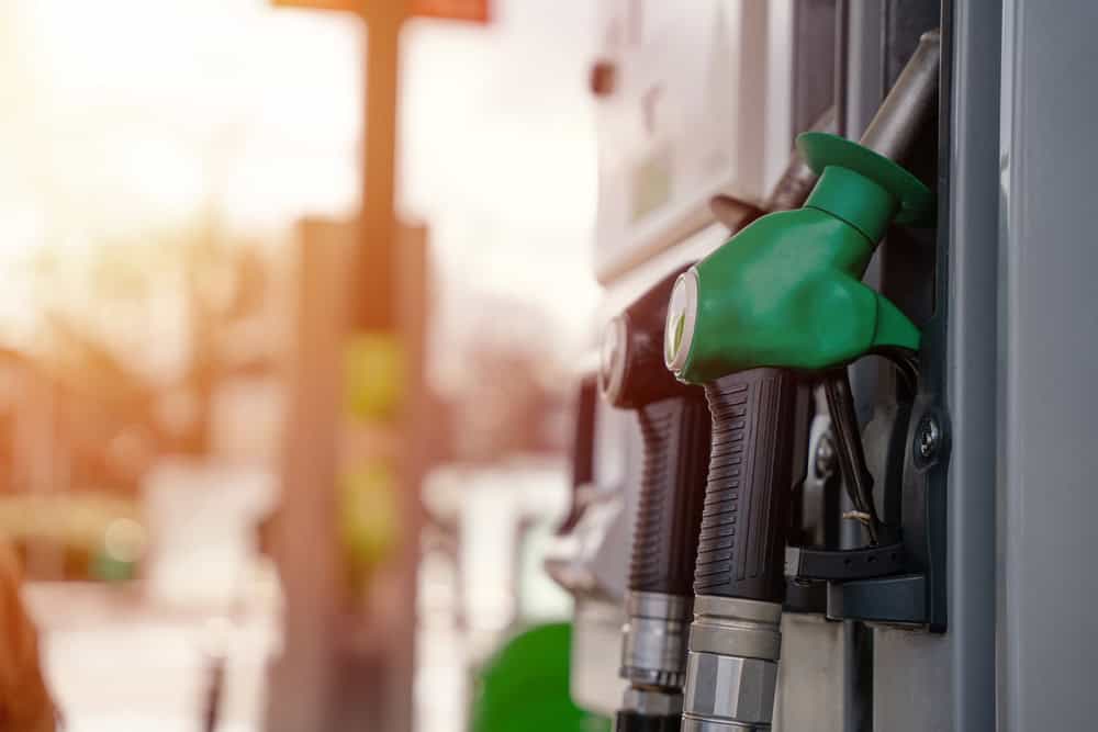 Close,Up,Of,Diesel,And,Petrol,Fuel,Pistols,At,A